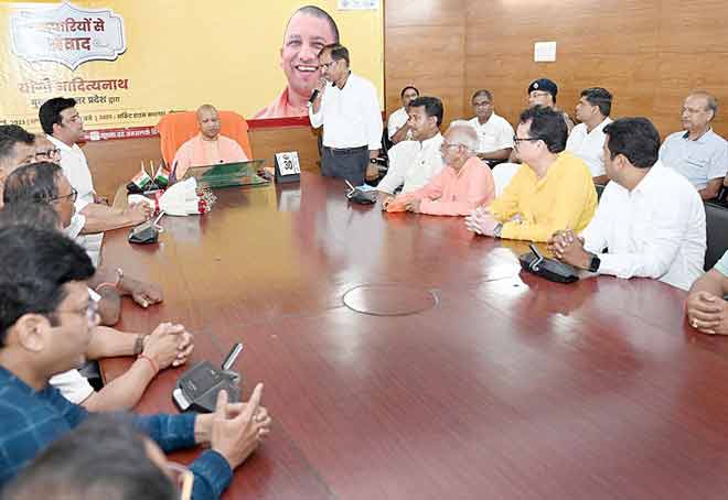 Govt determined to provide security, convenience & facilities to state traders: UP CM Yogi