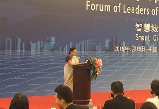 Guj CM calls for people to people connect at a forum in Beijing