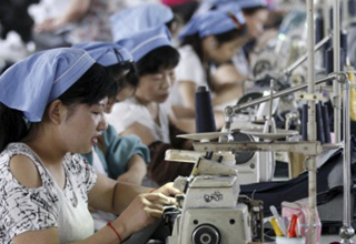 China's factory output shrinks to six and half year low