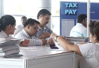 RBI asks income tax assesses to pay IT dues in advance